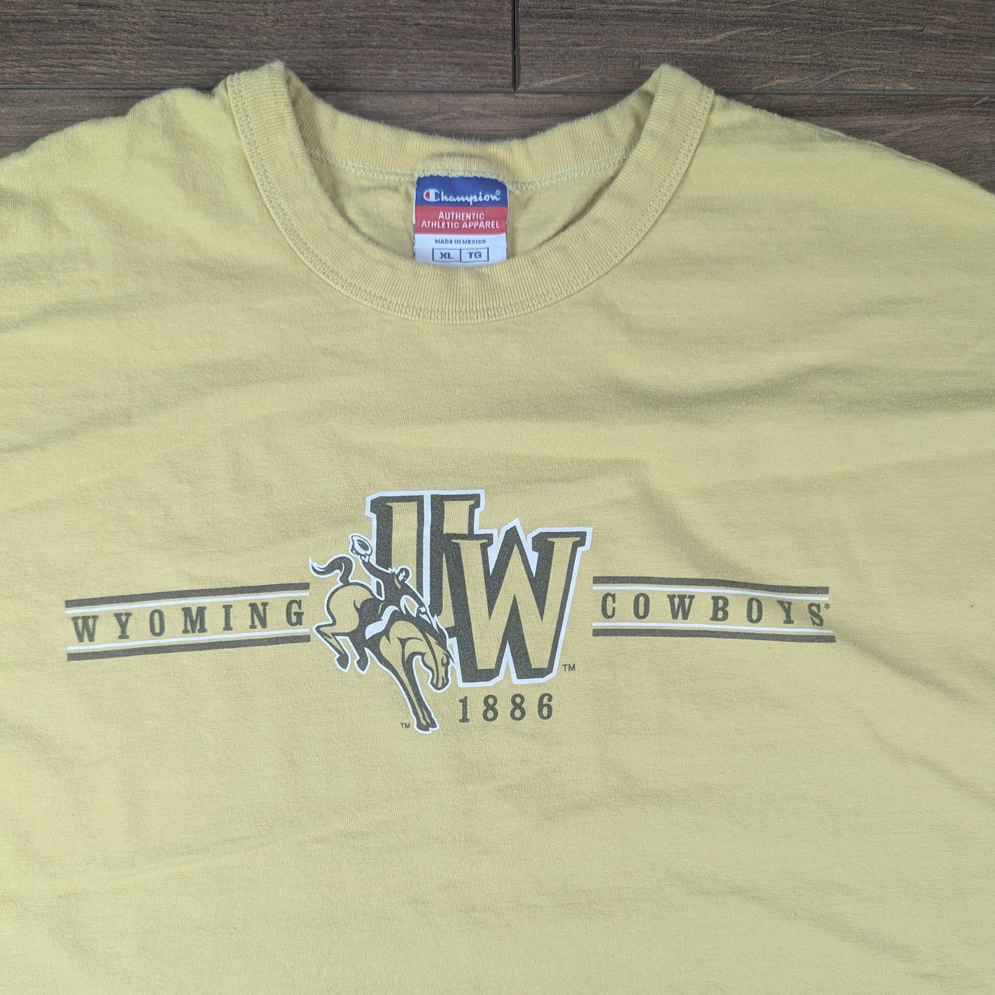 Yellow 00's Vintage Champion Wyoming Cowboys Graphic T-Shirt Size L