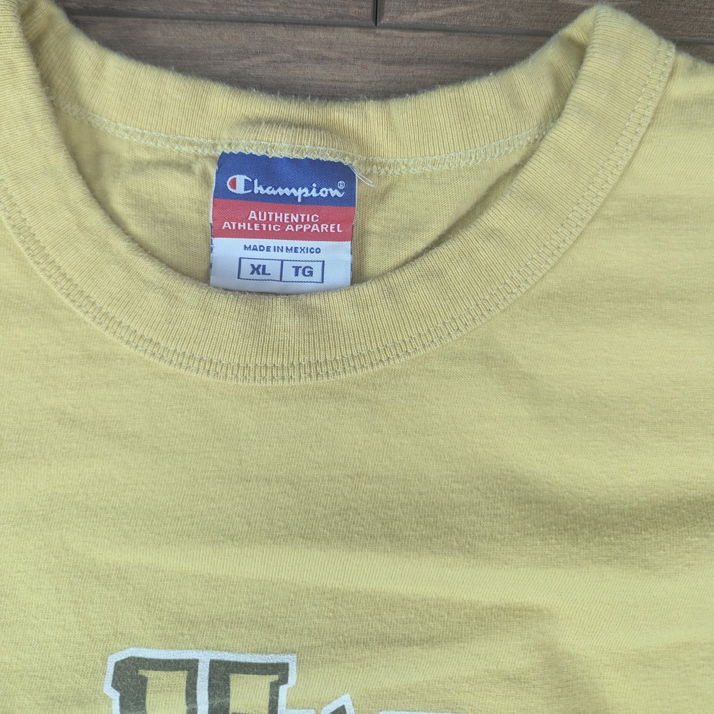Yellow 00's Vintage Champion Wyoming Cowboys Graphic T-Shirt Size L